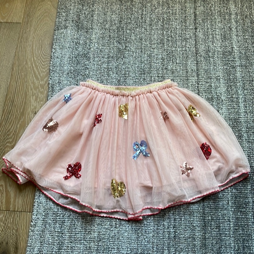 Mini Boden skirt with sequin embellishments.